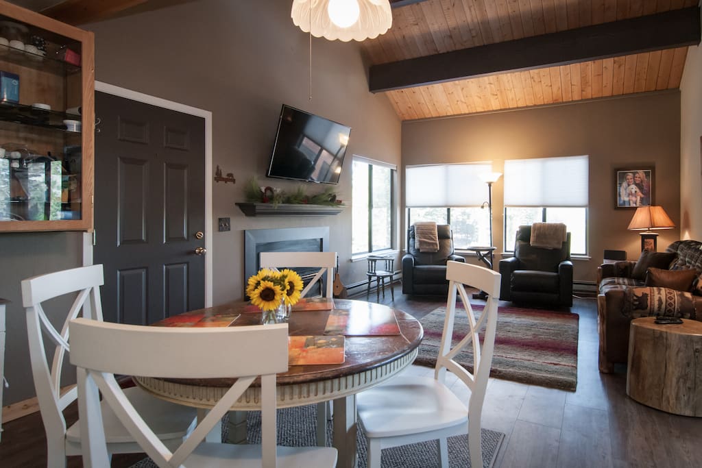 Kitchen/dining area flows into family room. Dining table is expandable to seat 6 or more.