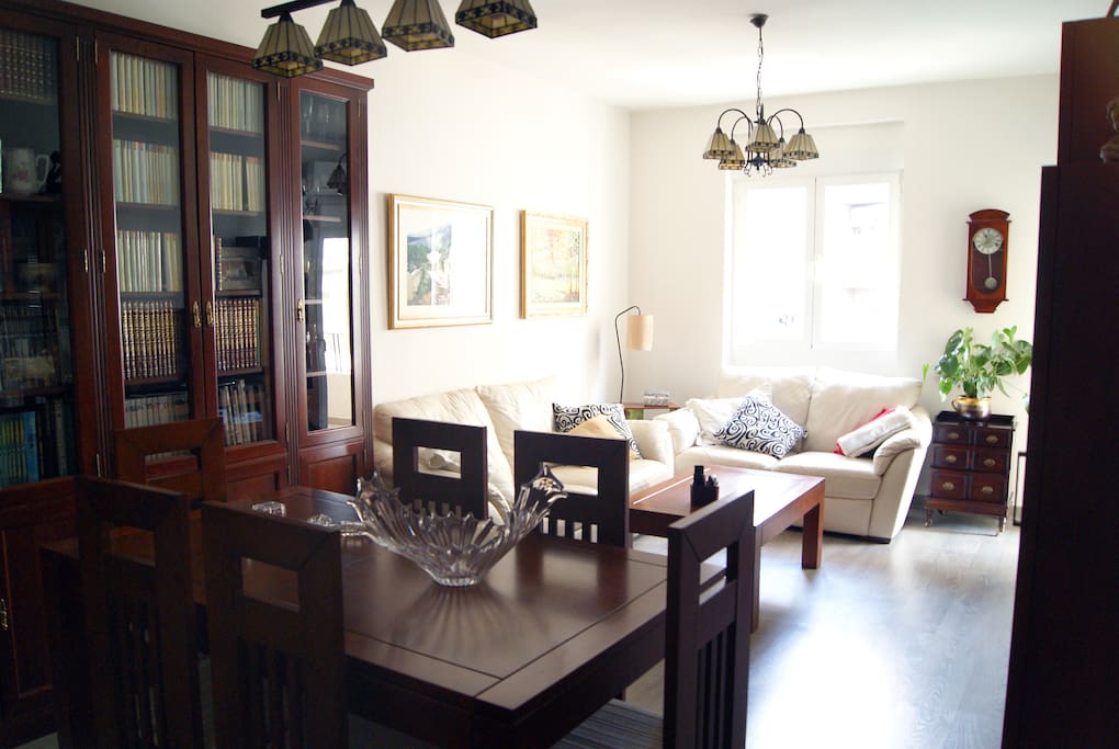 The living room is modern but full of personality, with a traditional Spanish vibe.