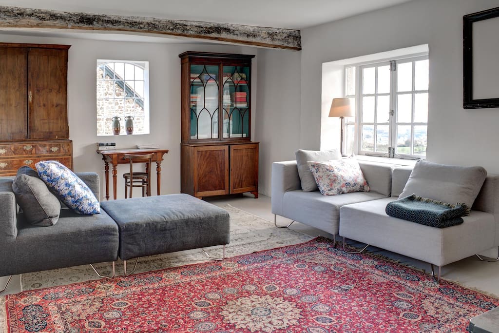 Large sitting room with two sofas.