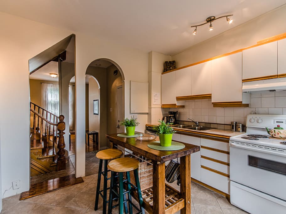 Well light kitchen with much sunlight coming in from both front and back windows.