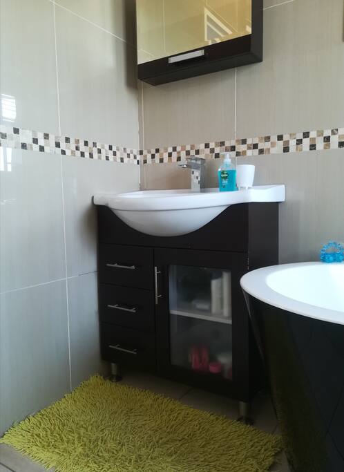 Bassinet in private bathroom