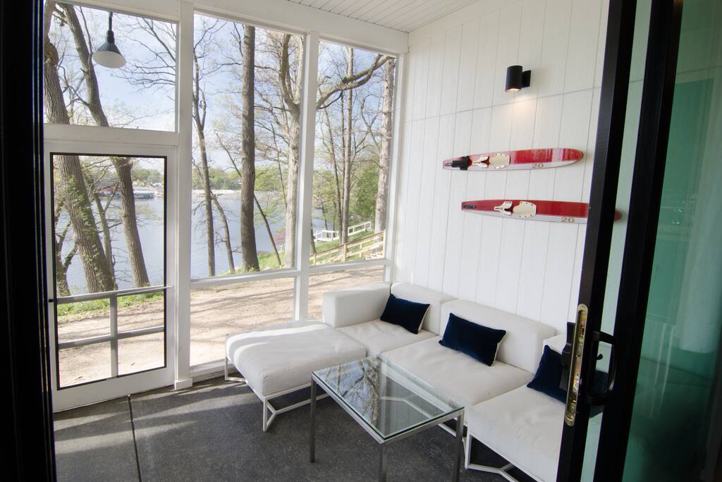 Screened porch with sectional sofa & outdoor dining table