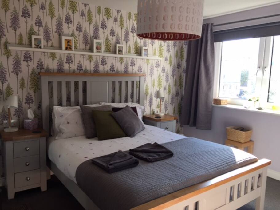 Master bedroom with comfortable kingside bed with en-suite