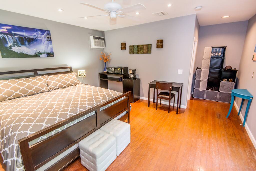 Full kitchenette with toaster oven, microwave, coffee maker, mini fridge.