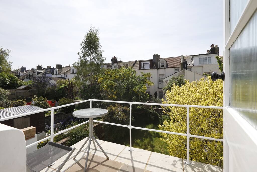 Balcony overlooking garden. Suntrap.