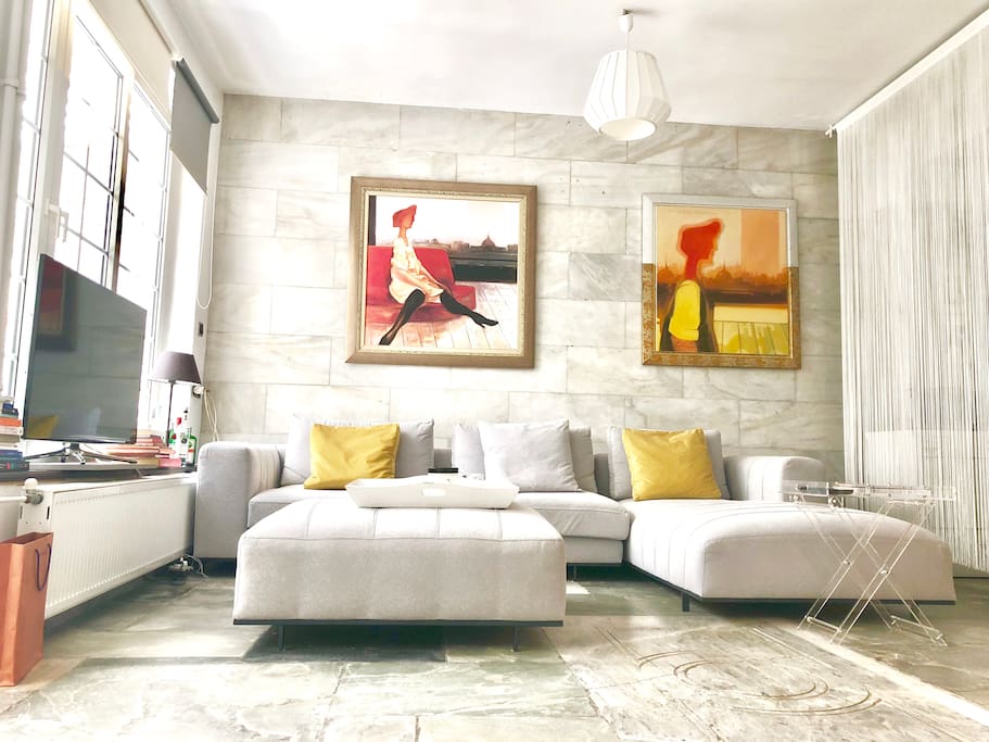 Living room with 50' Samsung smart tv and extra large and comfortable sofas.