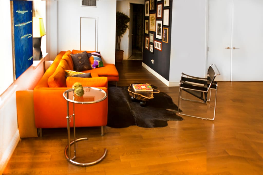 Lounging on italian custom build sofa section and Marcel Breuer chair