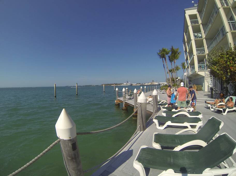 Deck for sun bathing and boat watching surrounded by Tiki bar with local music.
