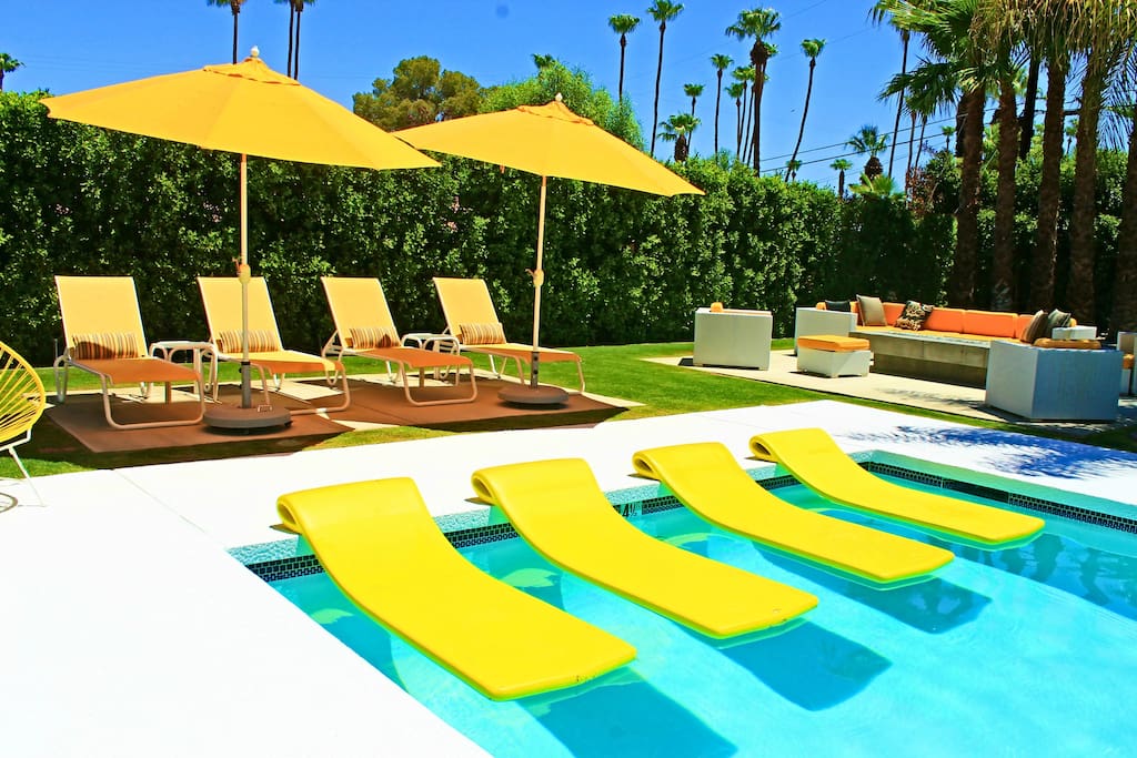 Plenty of pool floats, umbrellas and chaise lounges for everyone