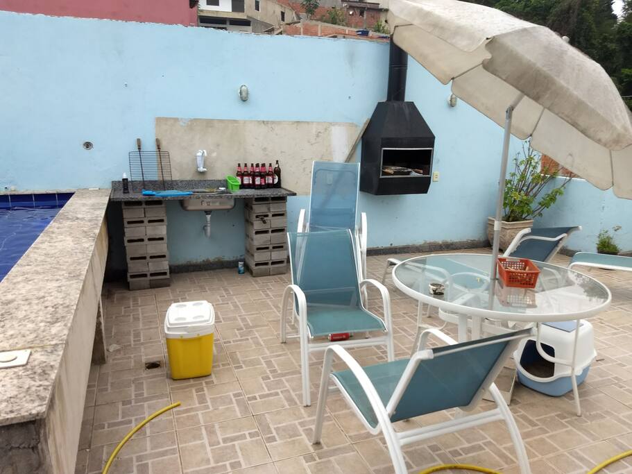 terraço para banho de sol, piscina e churrasqueira