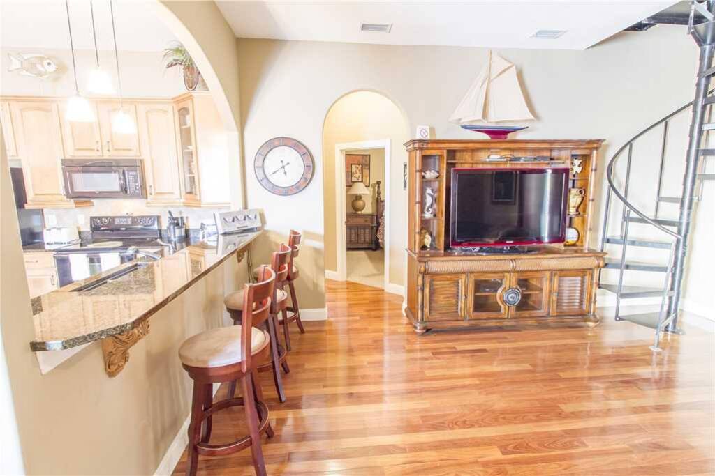An Easy Open Layout - Thanks to the open floor plan at Seaside Escape, from the kitchen you can keep an eye on the kids at the di