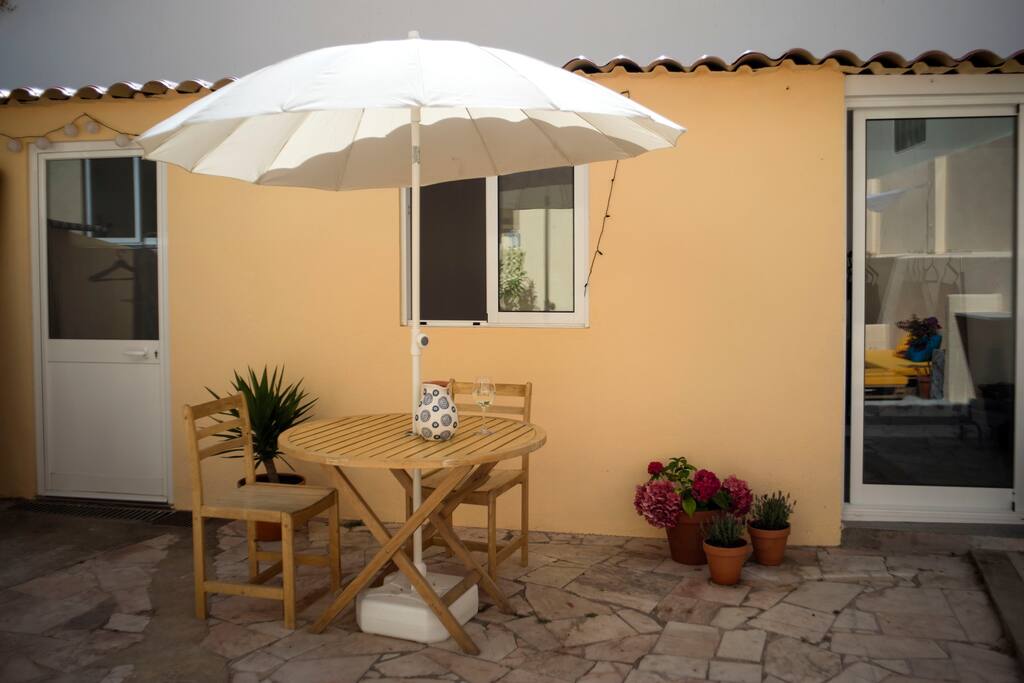 Outdoor dining area with BBQ