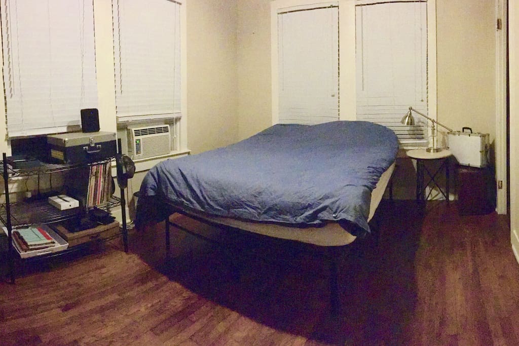 Private bedroom space with record player, bt wirless speaker, window unit