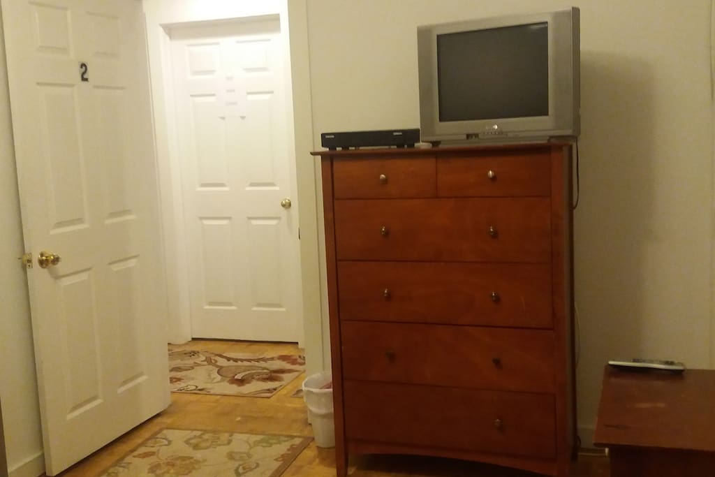 Dresser and television with cable TV box