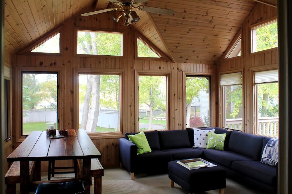 Four room porch overlooking the backyard. Perfect for eating and relaxing.