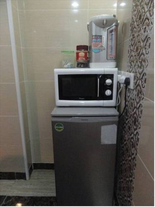 Shared microwave and fridge. Free hot water and coffee