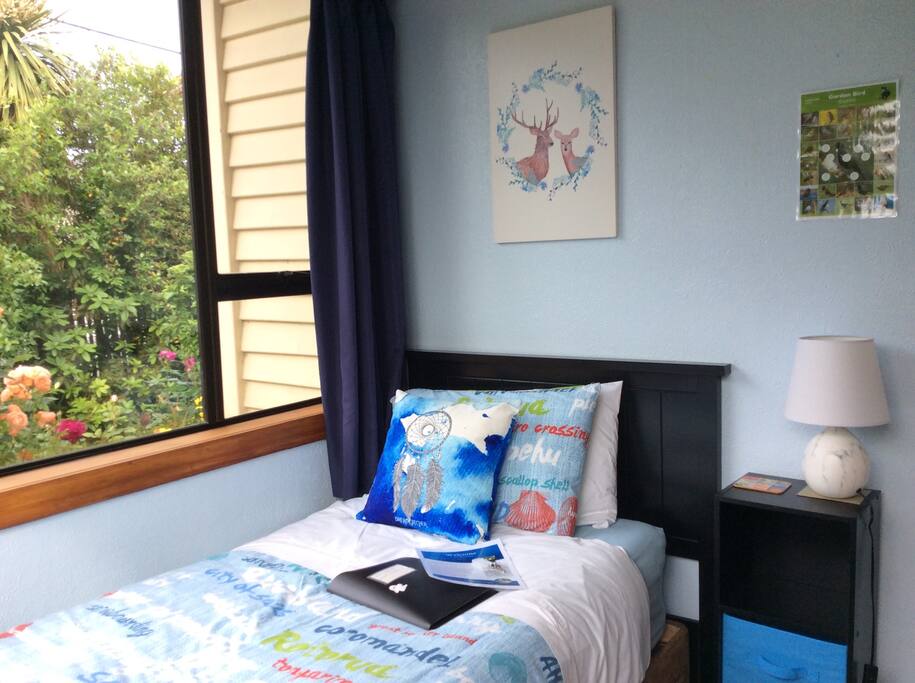 Super sunny room with two huge windows looking out to the garden
