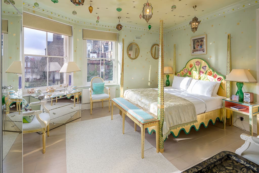 Fantastic master bedroom with a four post bed