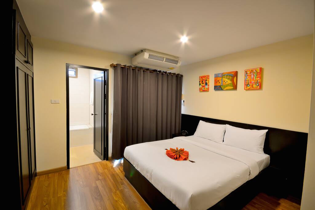 Queen size bed and wardrobe in master bedroom