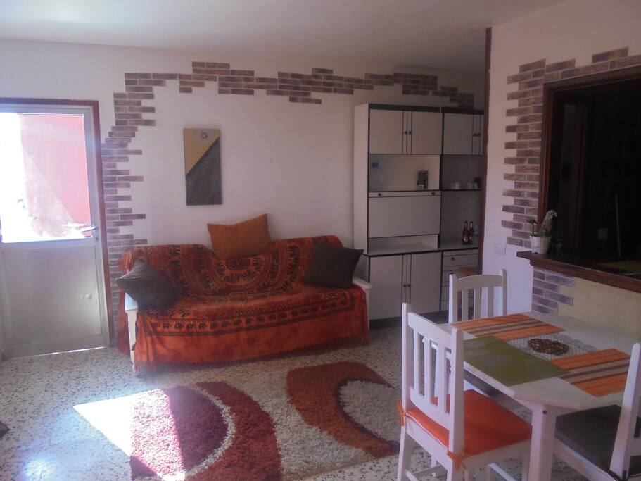 Sofa in living room with terrace door