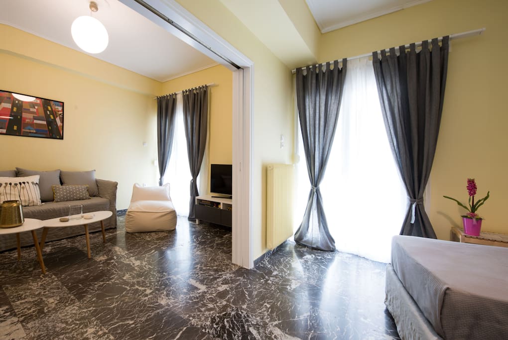Wide angle view of the living room and the bedroom