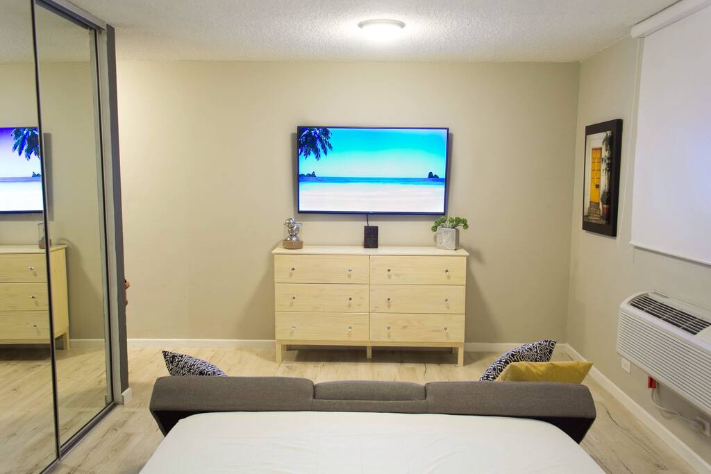 watch TV from the bed or sofa, enjoy a LG 55" 4k ultra HD smart tv, and FREE NETFLIX
