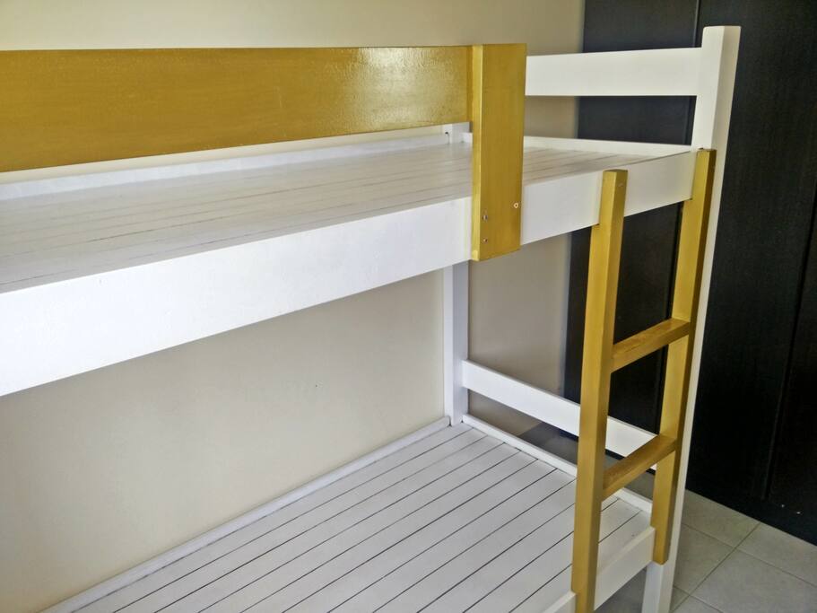 Customized bunk beds to maximize the bedroom space.