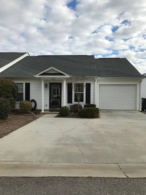 Single car garage with 2 additional parking spaces.