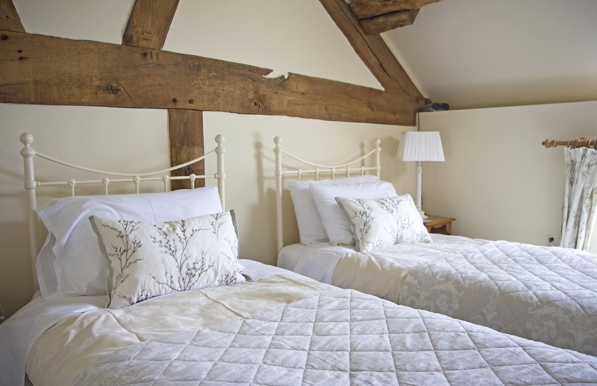 Chambre avec lits jumeaux. 