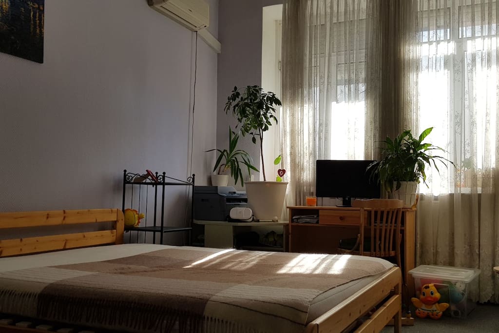 first bedroom. king size bed. a lot of light during the day. it has air conditioner and anty sun rollers.