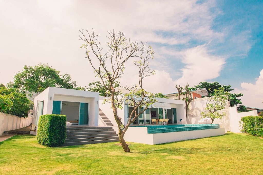 A view from the pier, the master suite and the main house overlook the sea.