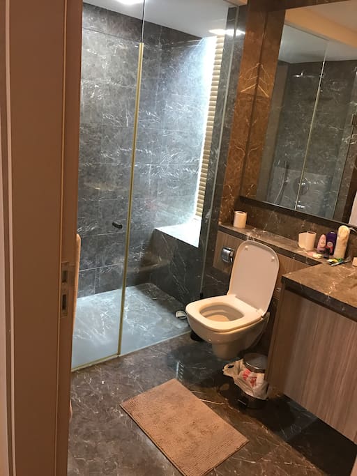 Bathroom of the master room. Huge shower area with shampoo etc provided. Very clean and there’s a huge mirror inside too.