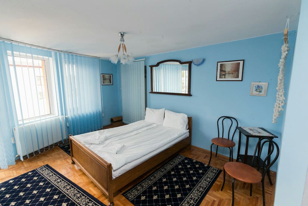 The room no 4 is painted in a beautiful blue colour. It has one large bed and one sofa. It's perfect for family with children, or for a nice couple. The room has private bathroom, a large balcony, TV, tv cable, free WiFi.