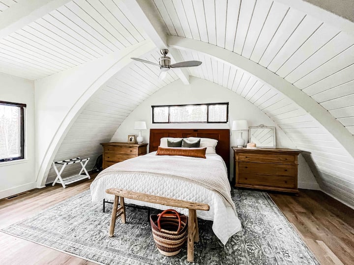 Master bedroom located upstairs with king bed and bathroom 1. 