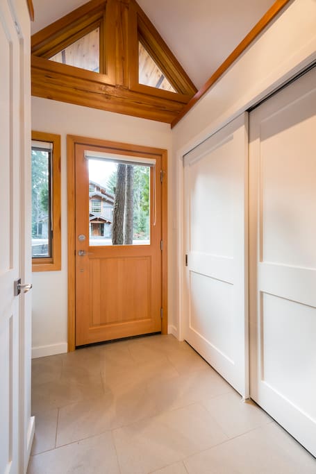 Entrance with lots of closet space and storage for skis, boots and boards