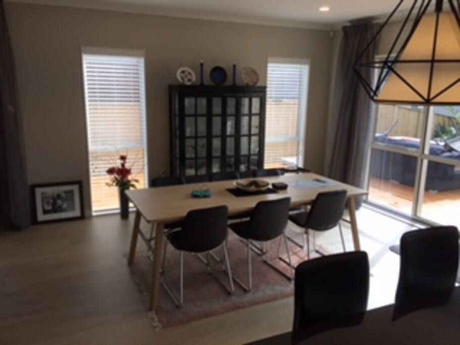 Dining table and chairs seen from our kitchen area.