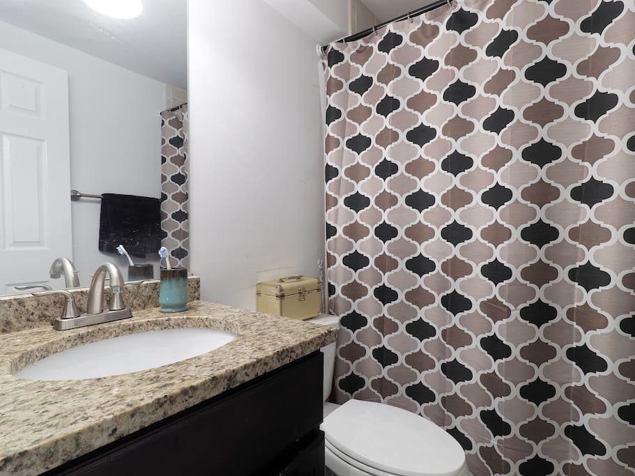 The bathroom is renovated and comes with all the amenities.