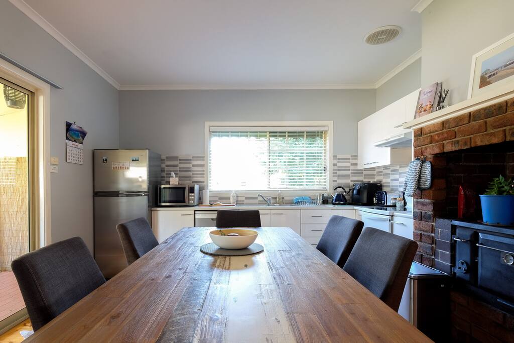 The kitchen is fully stocked with pots, pans, crockery and cutlery. There is a large fridge, dishwasher, oven, microwave, kettle, toaster and coffee machine.