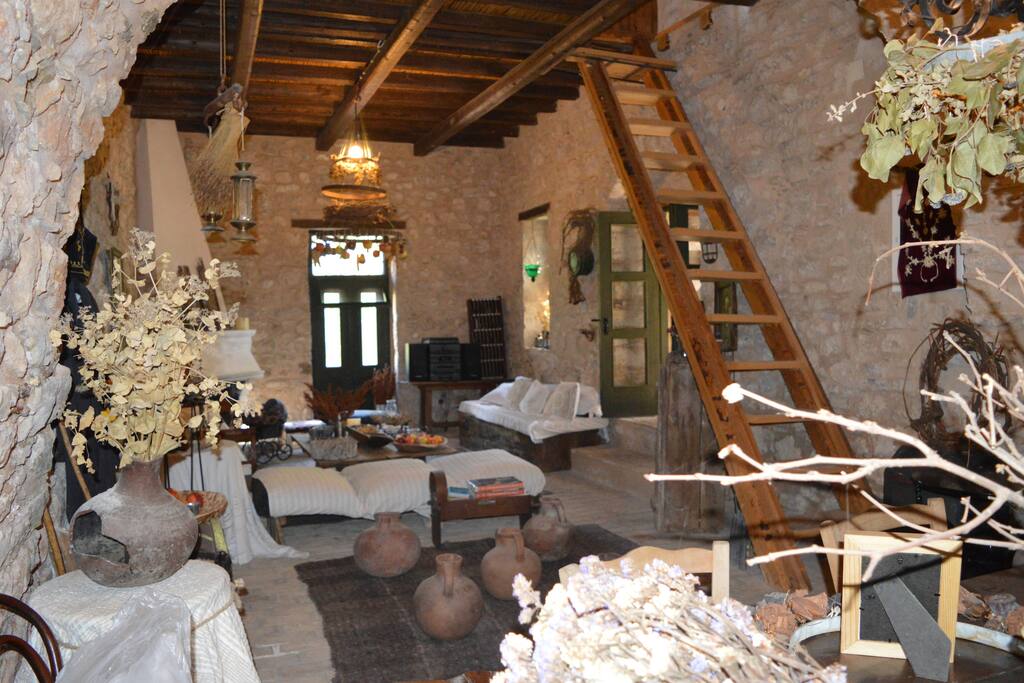 Winter staircase and traditional ceiling with wooden beams and reed