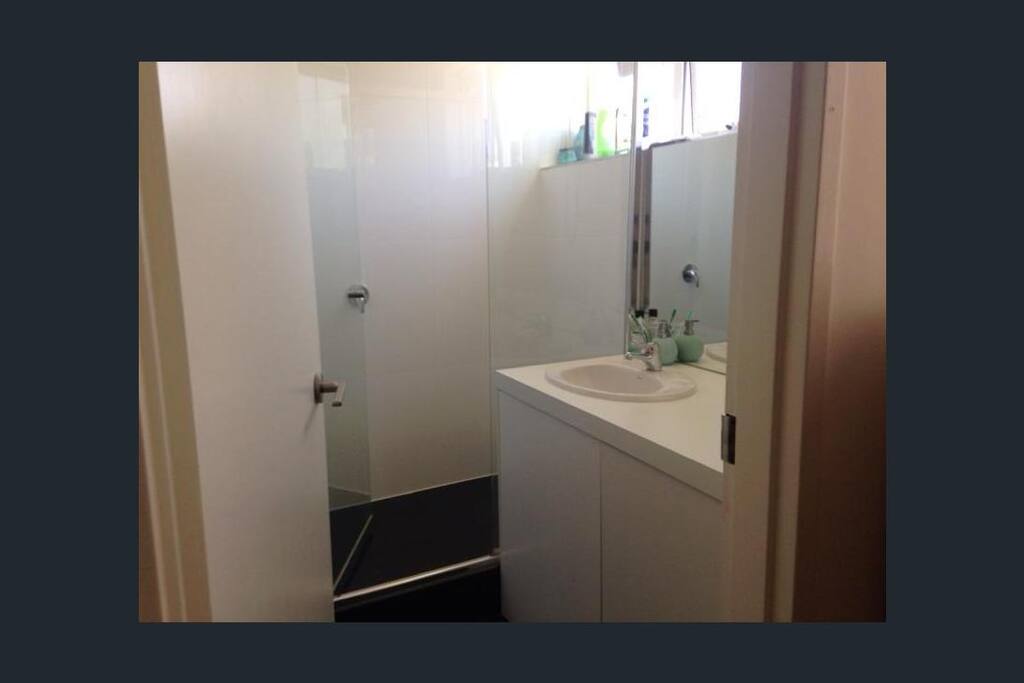 Bathroom and washing machine in cupboard