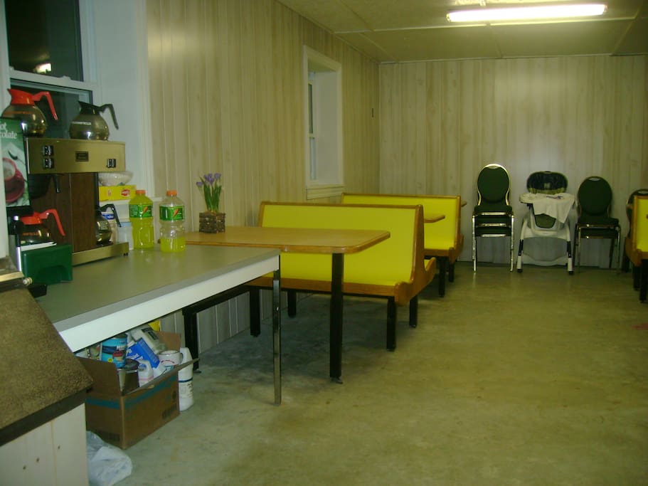 This is an inside dining area with a coffee bar.