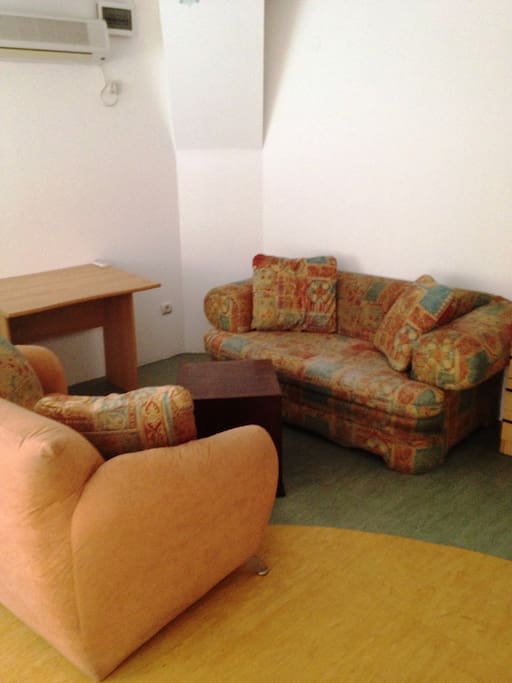 a Sofa and laptop place