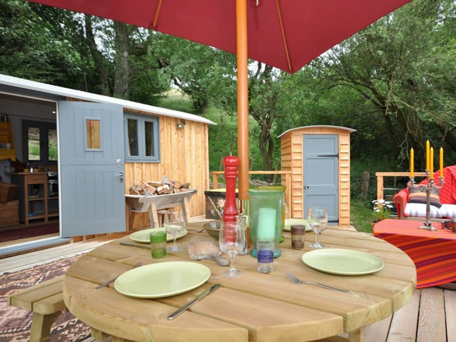 Table for Four on lovely wide decking (separate eco loo pictured to the right)
