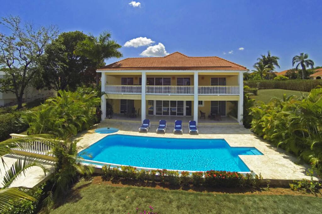 Oversize pool nestled in tropical garden