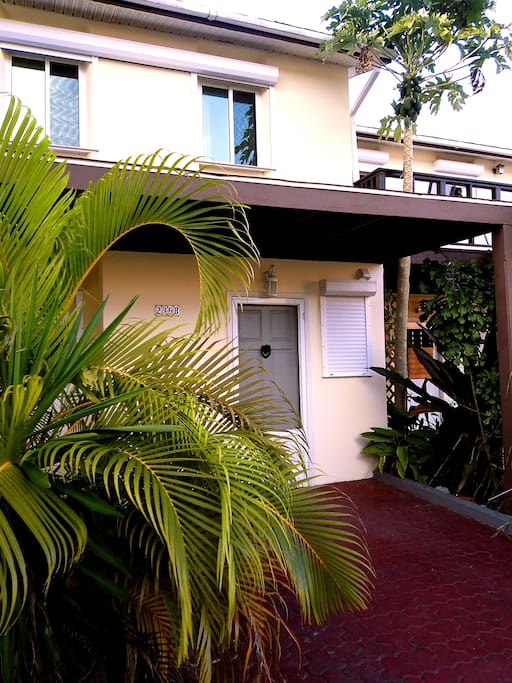 The splendid Villa Oasis entrance - pure comfort and relaxation immersed in a lush tropical nature.