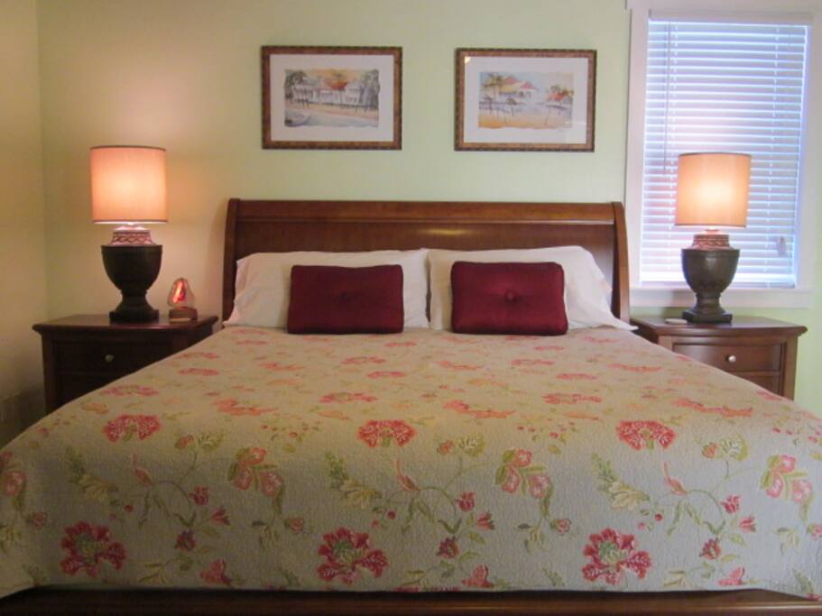 Master Bedroom with ensuite bath and entrance to covered deck