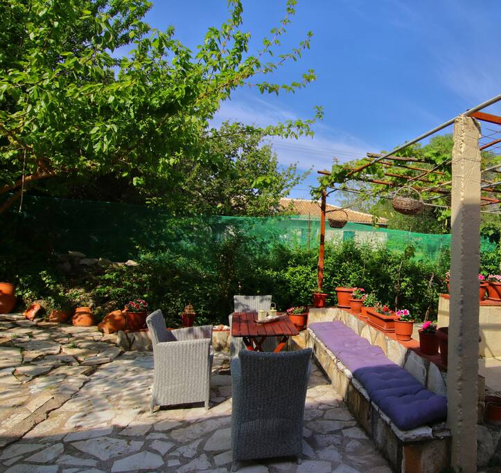 Enjoying the sun in the quaint, outdoor area