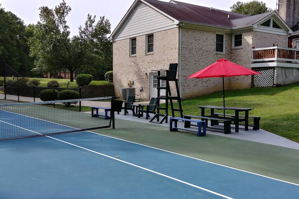 Access to entire lower level, tennis court & outside deck with grill