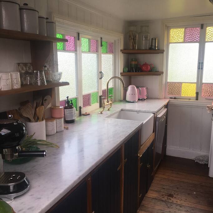 Fully equipped kitchen with marble bench top, butlers sink and Island bench for your convenience