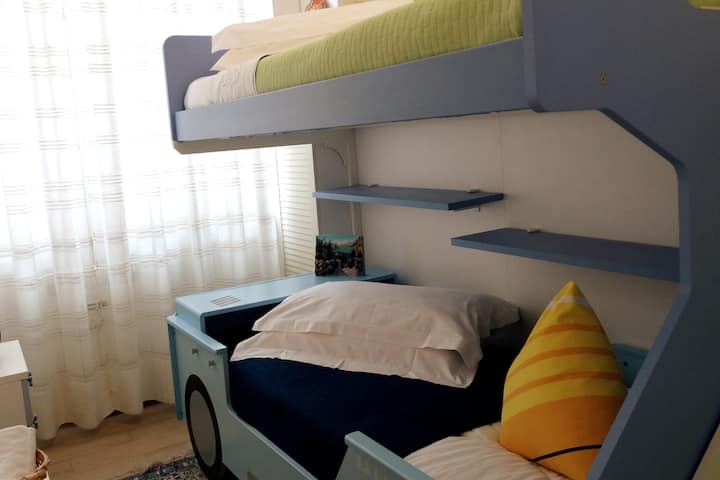 CHAMBRE À DEUX LITS - VUE DX